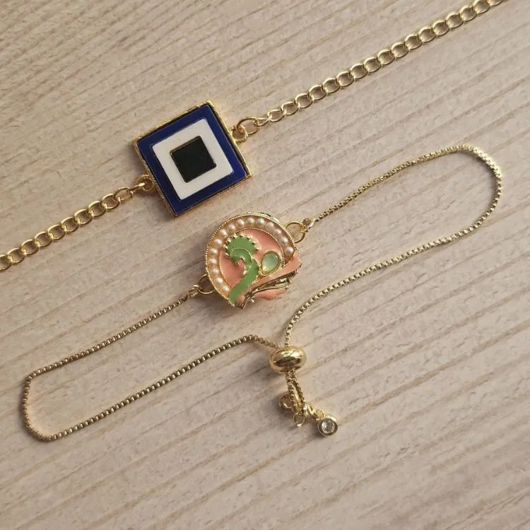 Designer metal rakhi for siblings with peacock evil eye